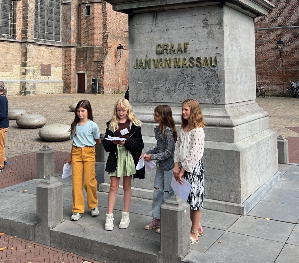 Juniorgidsen op het Domplein